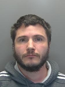 Andrew Murray custody photo.jpeg