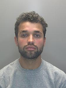 A photo of a dishevelled man. 