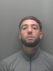 A custody photo of a man. 