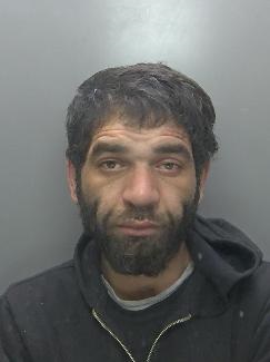 Custody photo of Ionut Radu