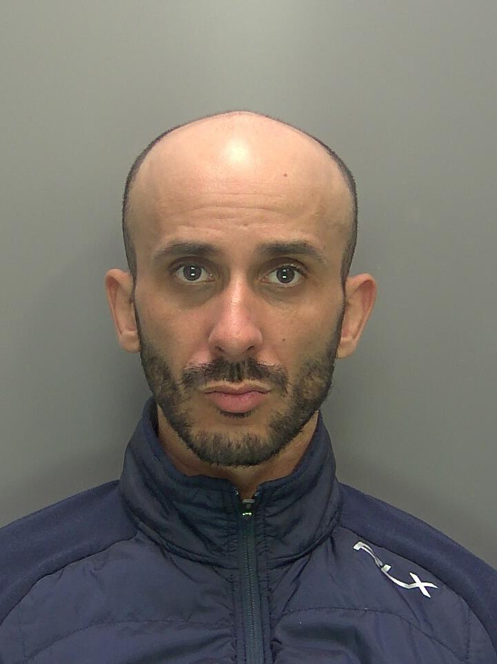 Custody photo of Lahouel-Guettala