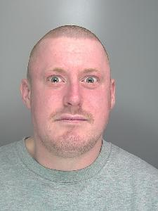 A custody photo of a drunk man. 