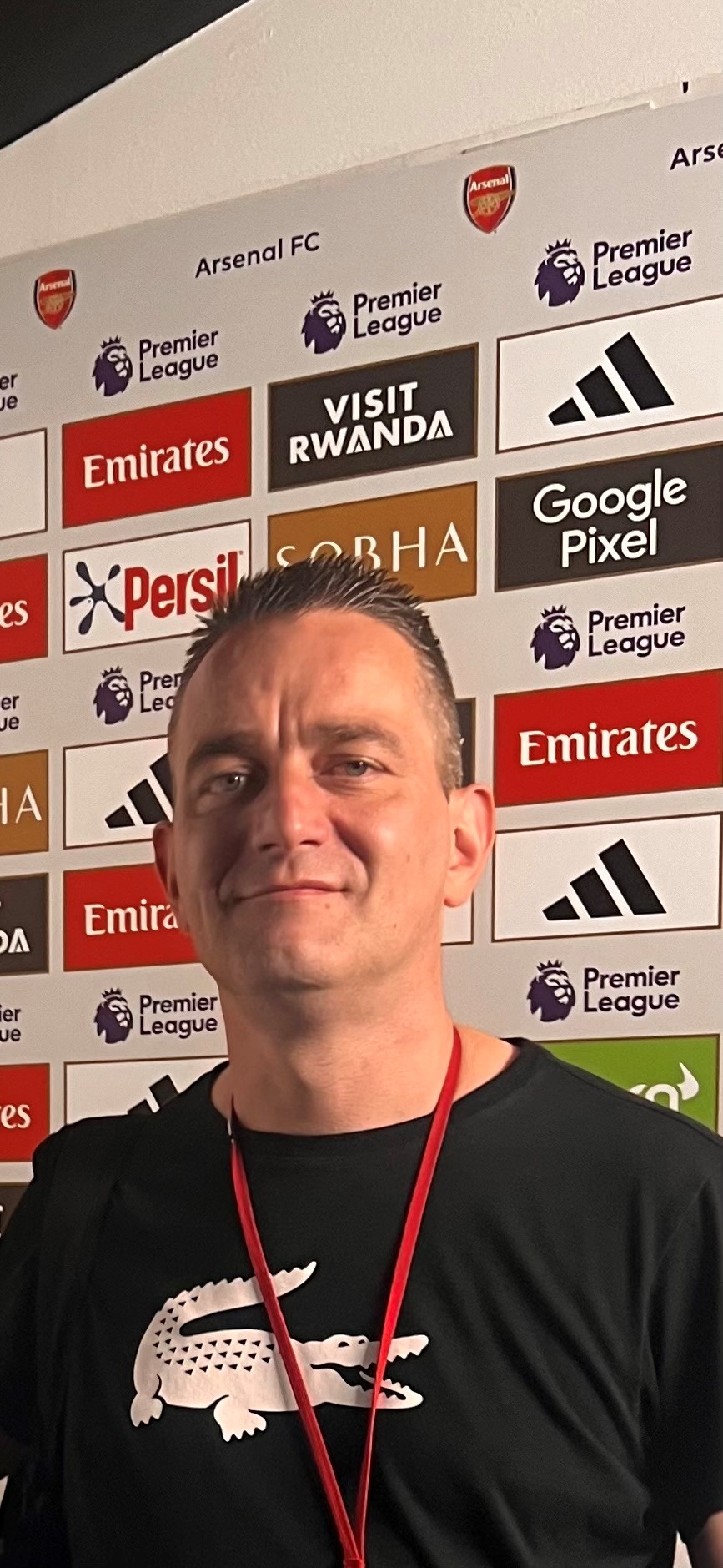 A photo of a man at Arsenal Football Club. 