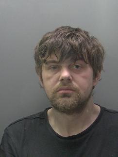 Custody photo of Adam Swales
