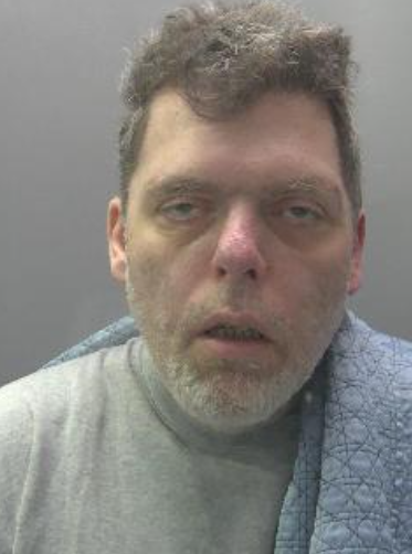A dishevelled man. 