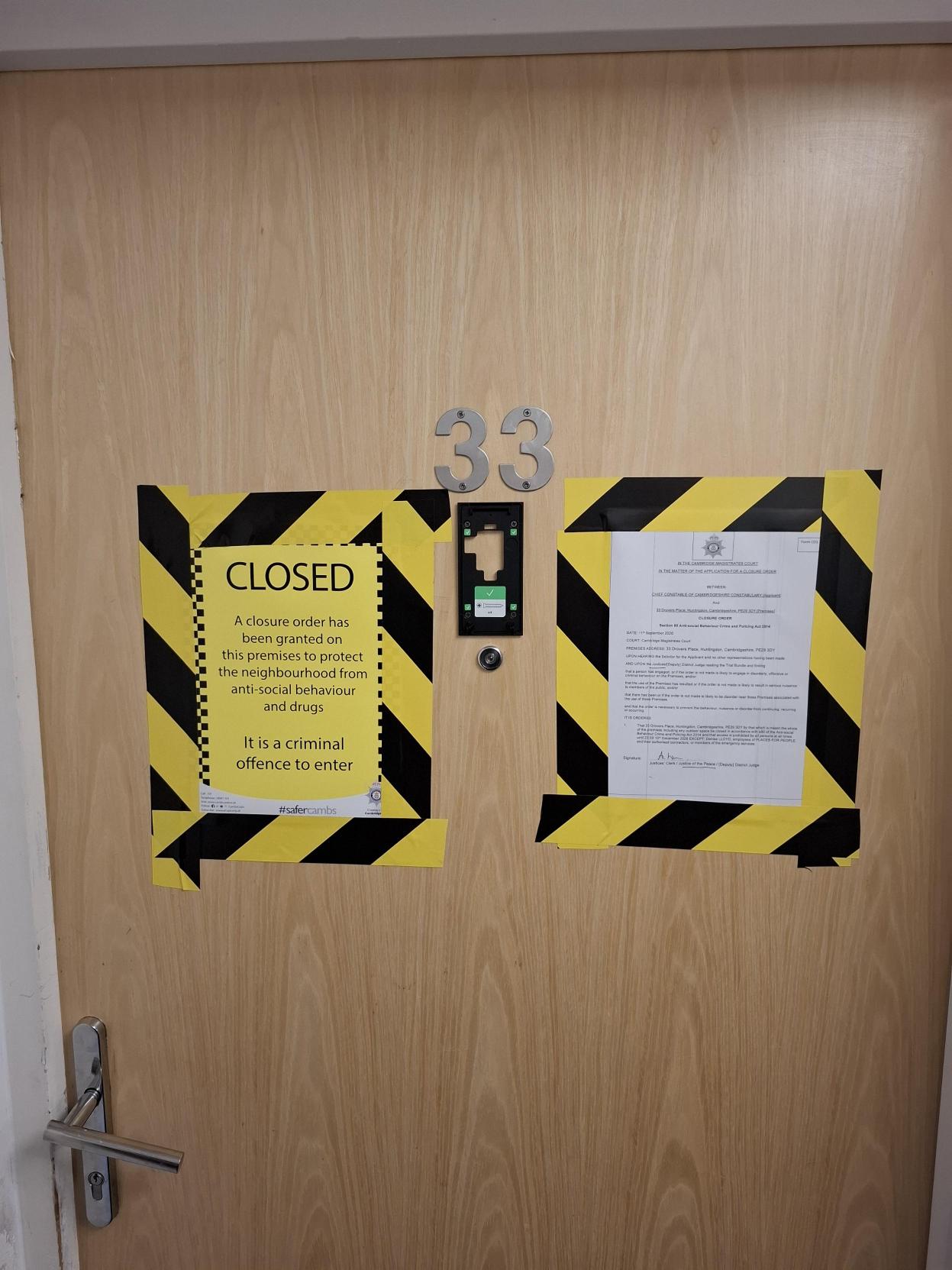 Closure order notice on a door in Huntingdon