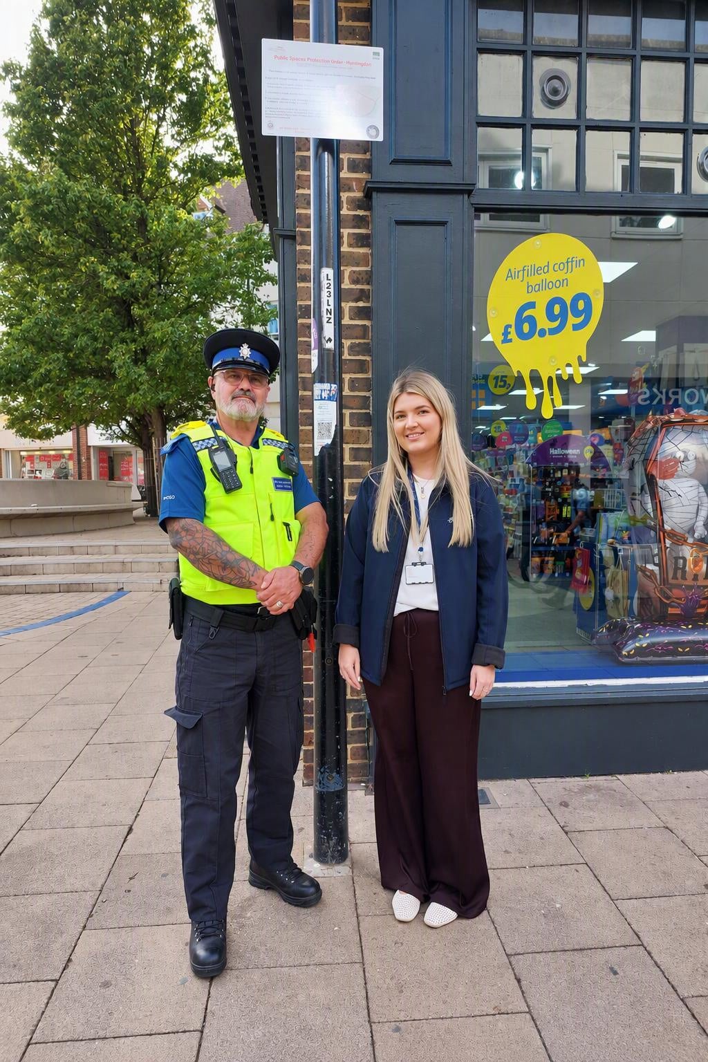PCSO Jim Gardner with Senior Community Safety Officer Georgia Patterson from Huntingdonshire District Council