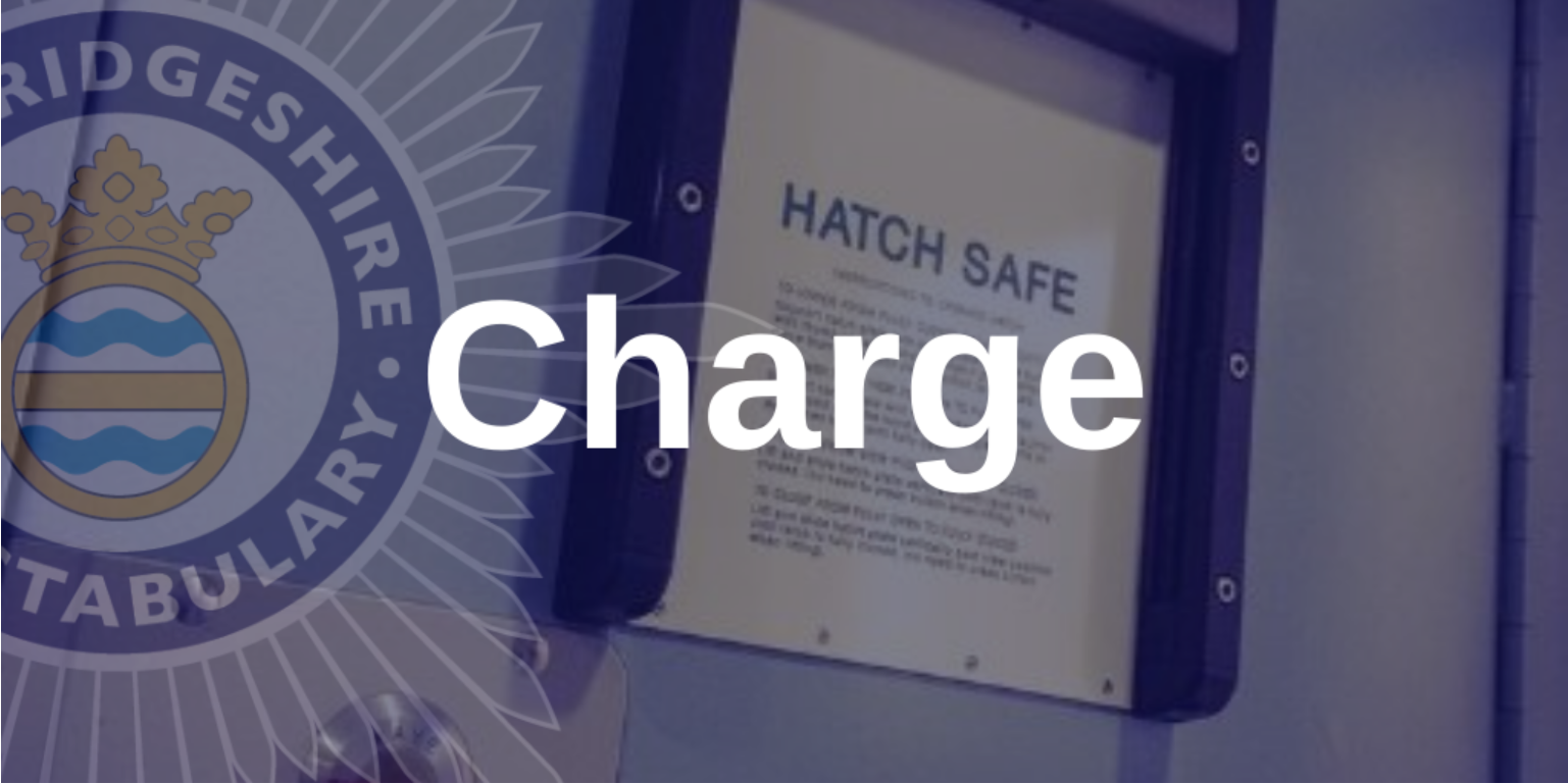 Close up of police custody cell hatch with charge text overlaid