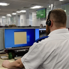 male-call-handler-at-desk